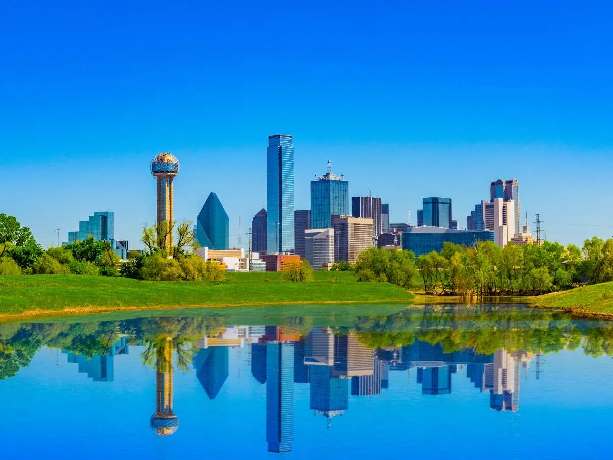 The Dallas skyline reflected in a pond