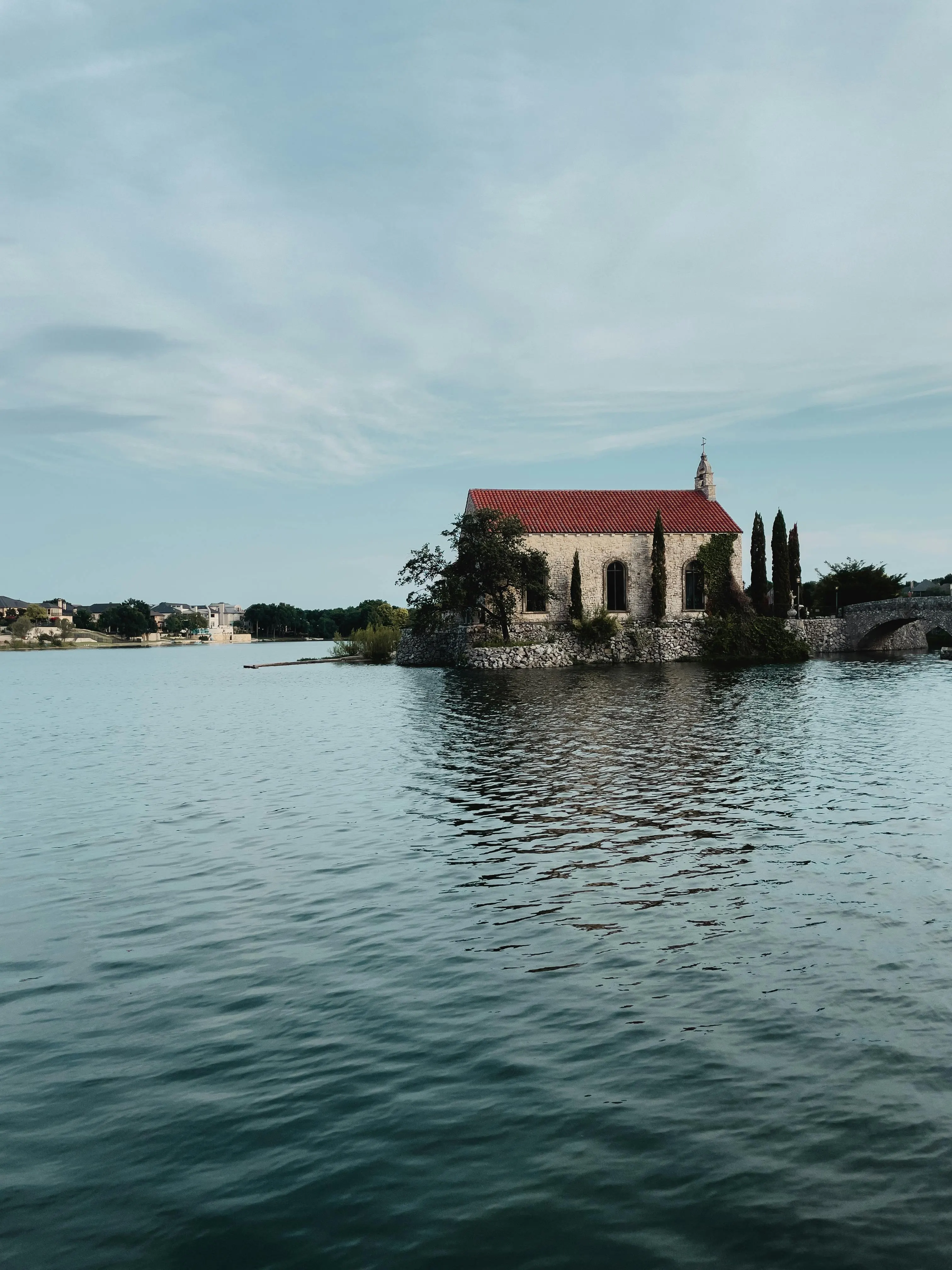 The stone chapel on the water at Adriatica Village in McKinney